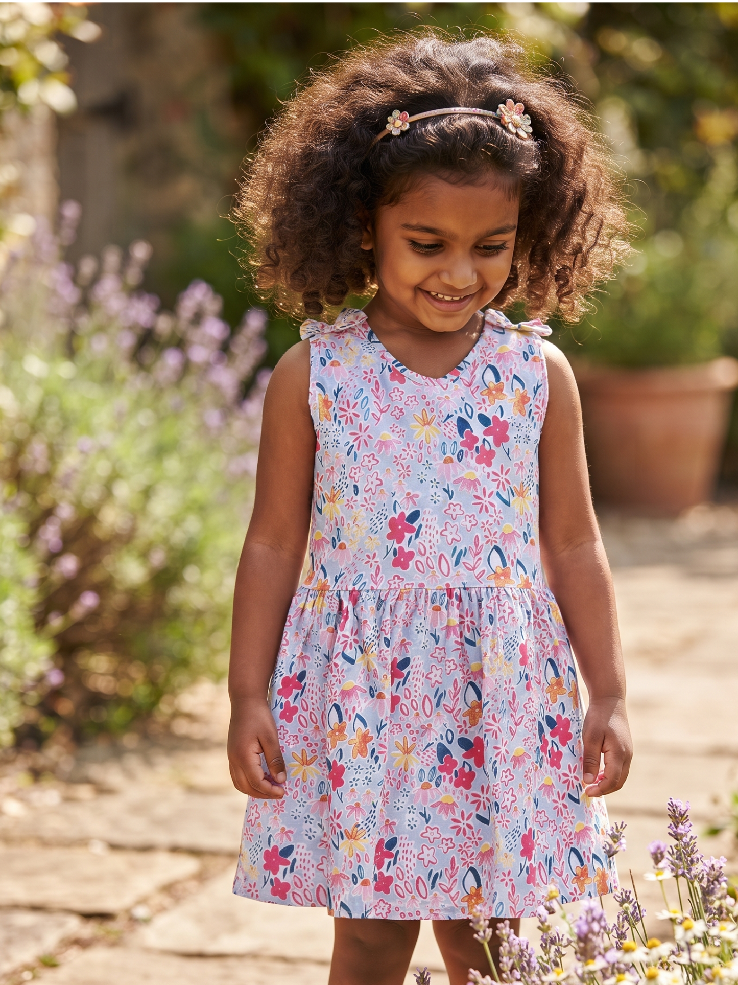 Flower Print  Sleeve less Frock with Bow
